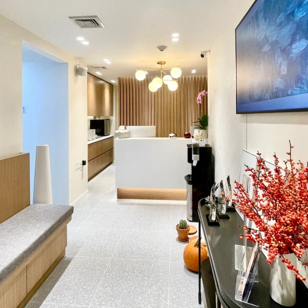 Modern dental office reception area with a clean and welcoming design