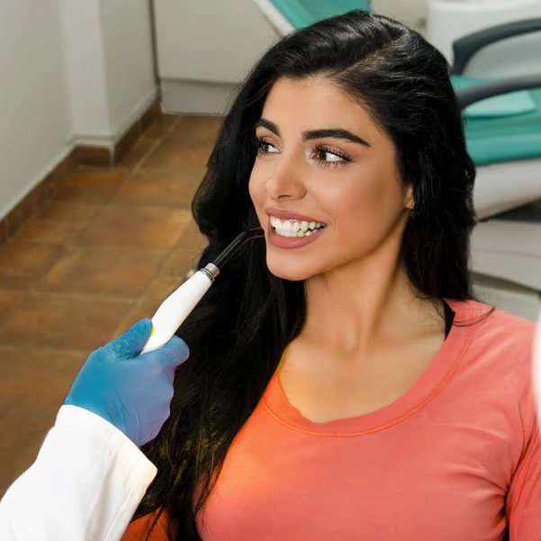 Patient smiling after cosmetic dental bonding treatment