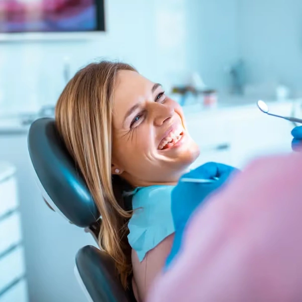 Patient relaxing during a routine dental cleaning and exam