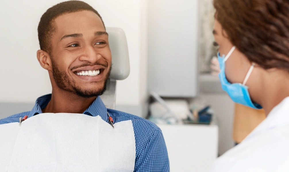 Dentist discussing treatment options with a patient