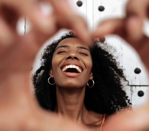 Woman smiling after a routine dental visit