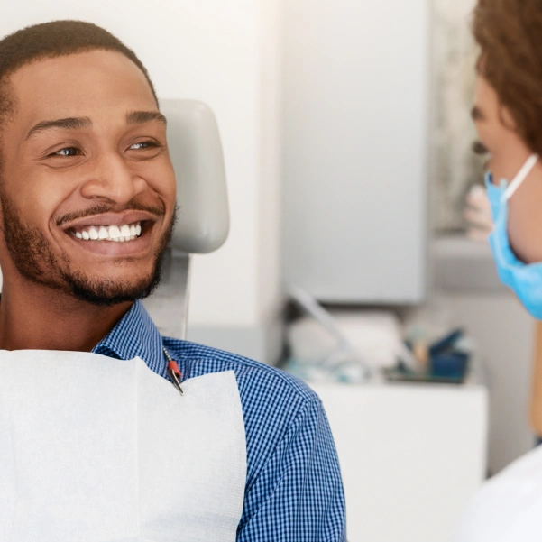 Dentist discussing treatment options with a patient