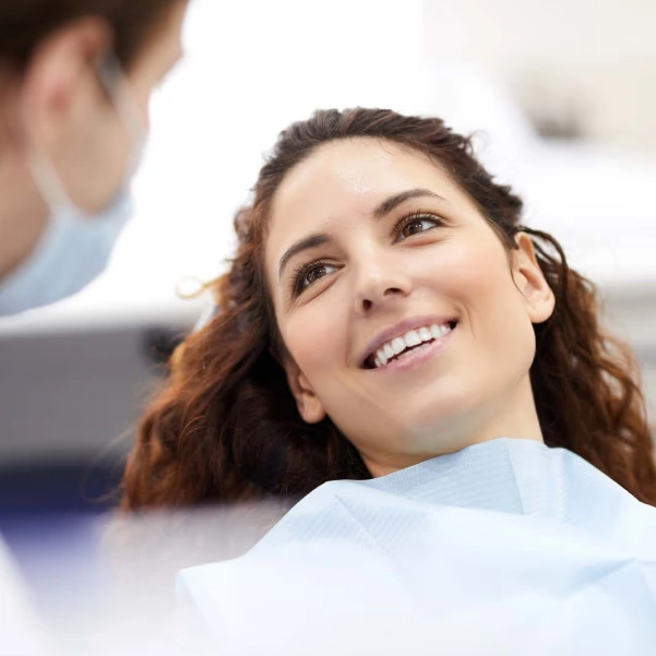 Patient smiling during an inlays and onlays consultation
