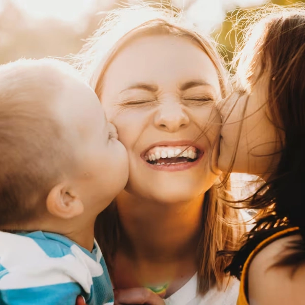 Happy family smiling together outdoors