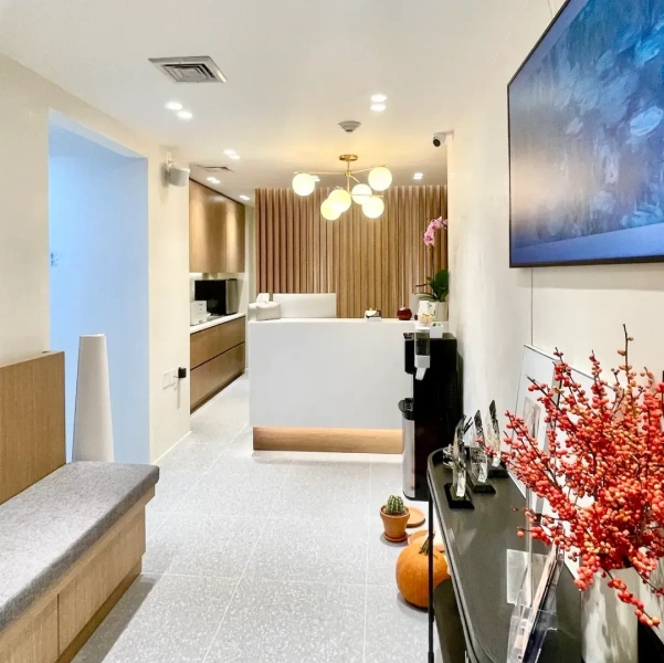 Modern dental office reception area with a clean and welcoming design