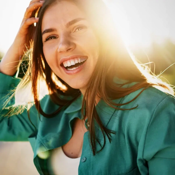 Happy patient smiling before a dental appointment