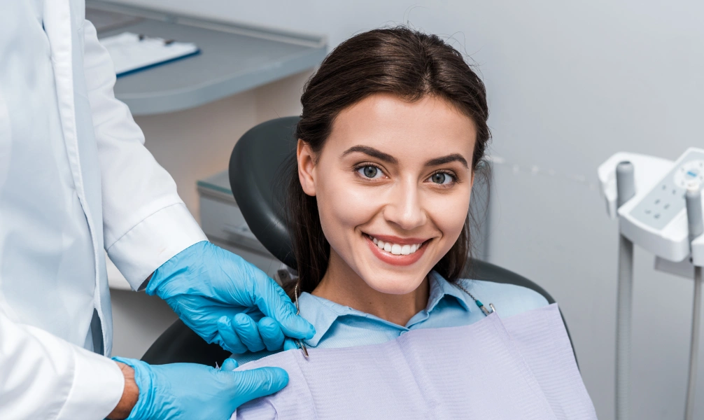 Smiling patient during a root-end therapy appointment