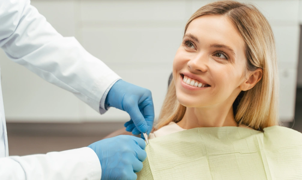 Dentist preparing a patient for a tooth extraction procedure